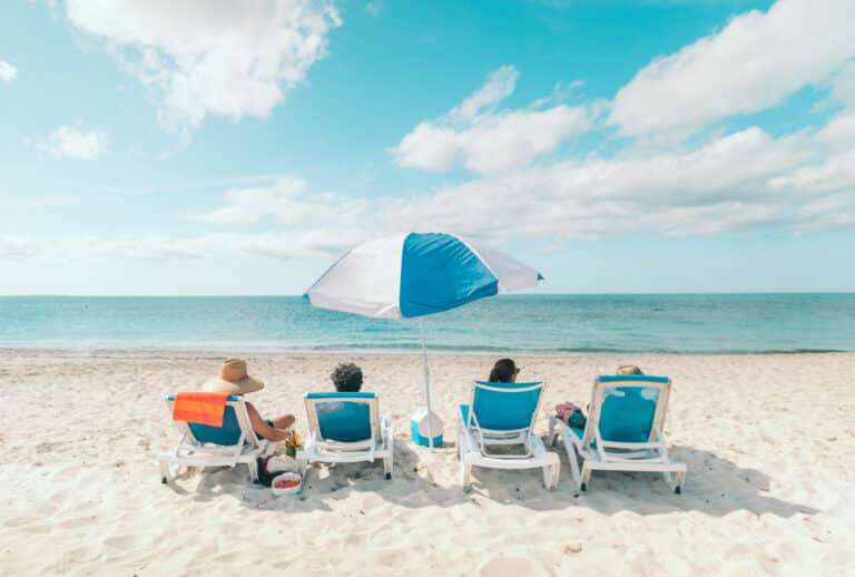 Villa Camilla Guests Lounging on the beach