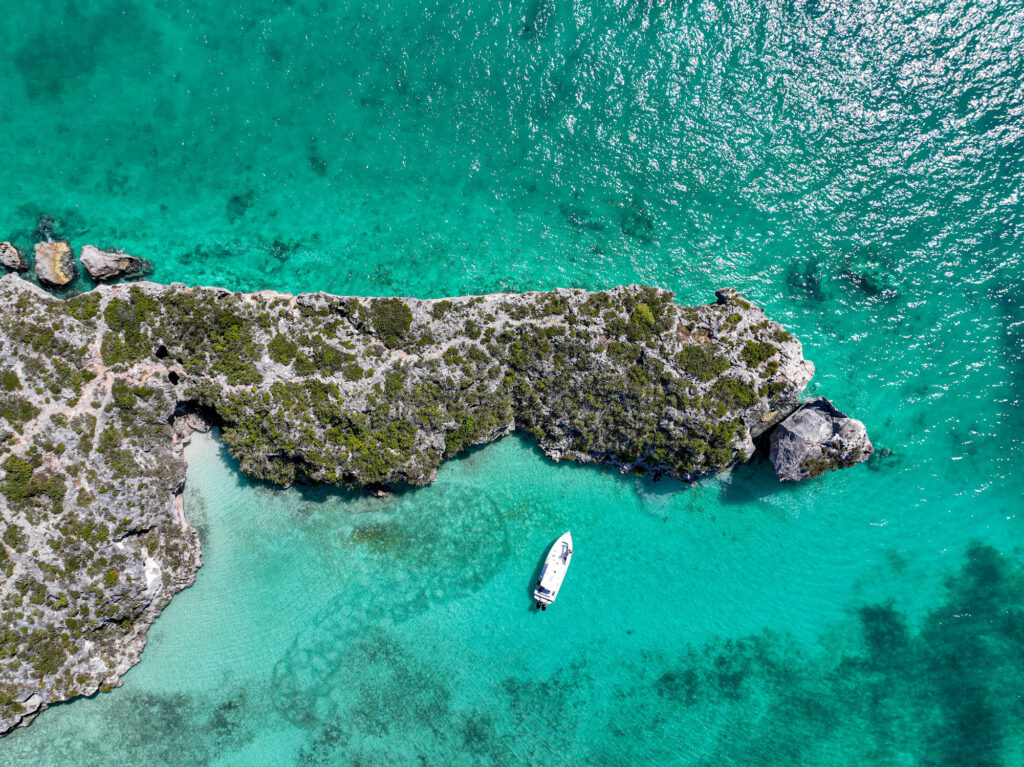 The awe-inspiring beauty of Split Rock is an iconic natural wonder in the southeast archipelago of Providenciales, Turks & Caicos.